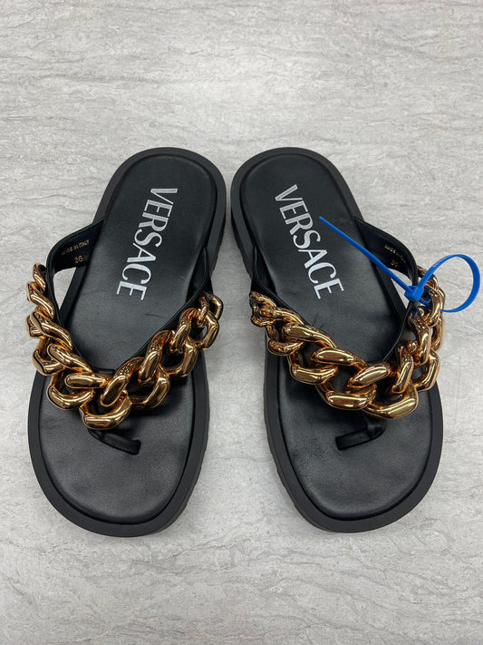 Sandals Luxury Designer By Versace In Black, Size: 6